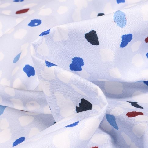 Tissu Coton imprimé Frou-Frou Pollen sur fond Bleu clair