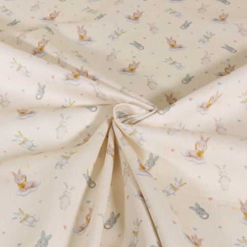Tissu Piqué de Coton imprimé Lapinou sur fond Beige clair