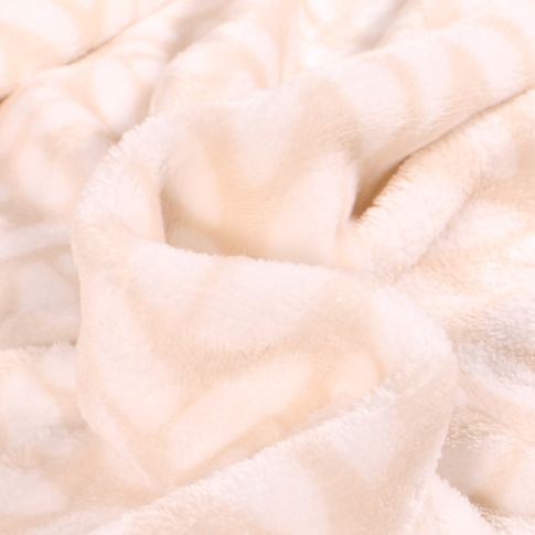 Tissu Doudou Pétales blanches sur fond Beige