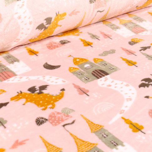 Tissu Doudou Châteaux et Dragons sur fond Rose