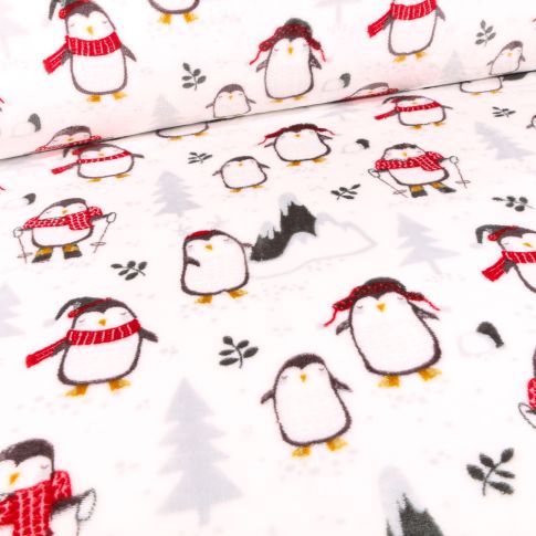 Tissu Doudou Manchots au ski sur fond Blanc