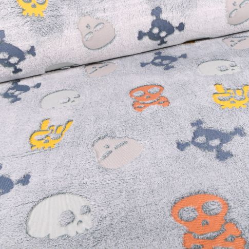 Tissu Doudou Têtes de morts sur fond Bleu ciel