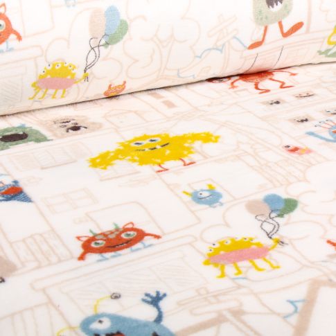 Tissu Doudou Monstres en ville sur fond Blanc cassé