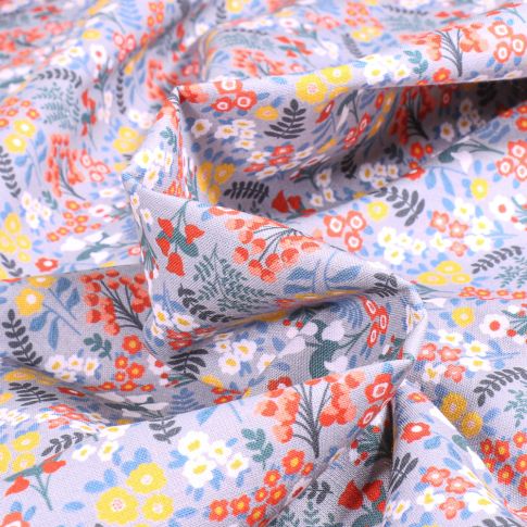 Tissu Coton imprimé MC Fabrics Fleurs diverses sur fond Bleu gris