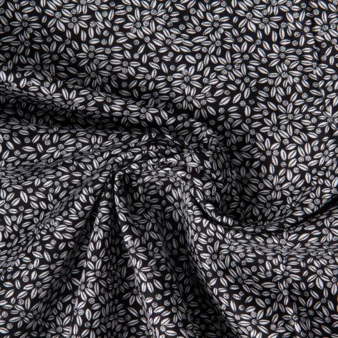 Tissu Coton imprimé Lutos Lio sur fond Noir