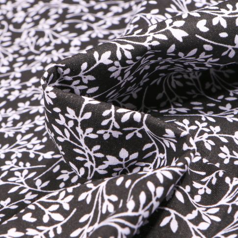 Tissu Coton MC Fabrics Feuillages blancs sur fond Noir