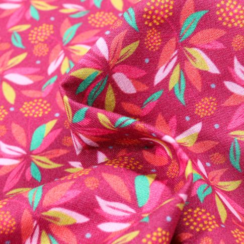 Tissu Coton MC Fabrics Feuilles colorés sur fond Framboise