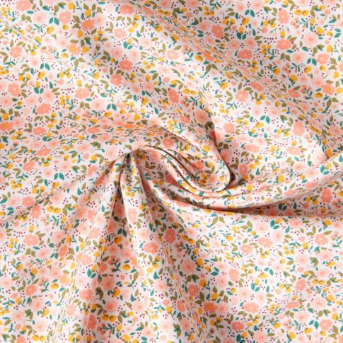 Tissu Coton imprimé Liberté floral  rose saumon sur fond Blanc