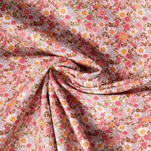 Tissu Coton imprimé Liberté floral  rose orangé sur fond Blanc
