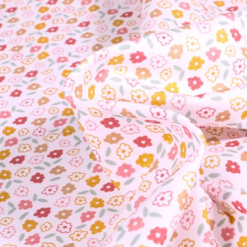 Tissus Jersey Coton Pâquerettes colorés sur fond Blanc