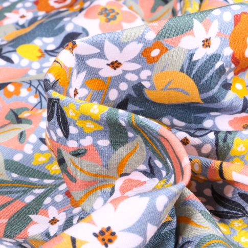 Tissu Jersey Coton Fleurs exotiques sur fond Bleu