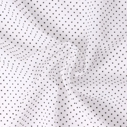 Tissu Mousseline  texturé Mini pois sur fond Blanc