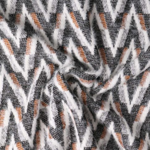Tissu Maille chevrons duveteux Camel sur fond Noir