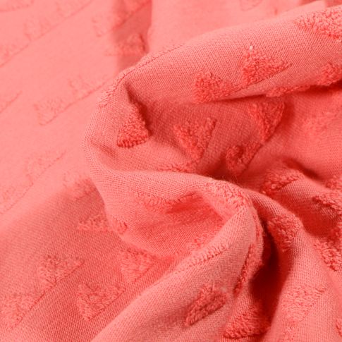 Tissu Jersey Coton Triangles en relief Helena Corail
