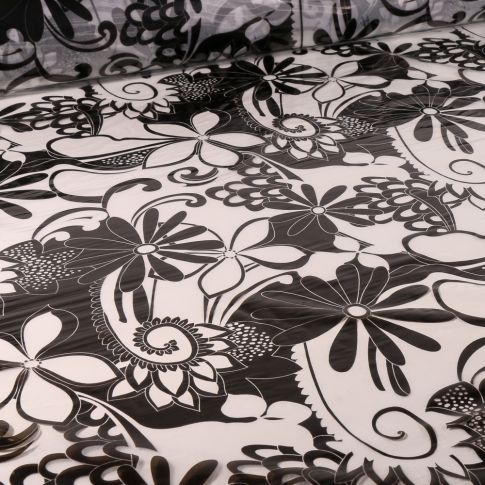 Tissu Imperméable  Fleurs noires sur fond Transparent