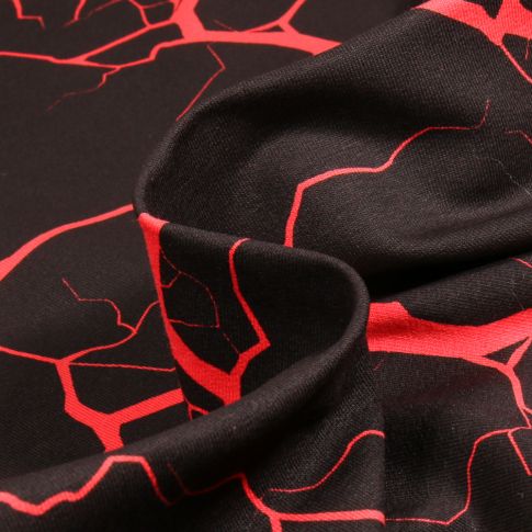 Tissu Jersey Coton Marbre rouge sur fond Noir