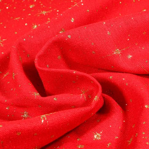 Tissu Toile de jute Etoiles scintillantes dorés sur fond Rouge