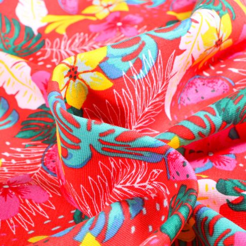 Tissu Jersey Coton Fruits et fleurs tropicales sur fond Rouge