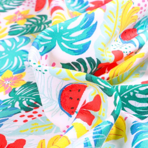 Tissu Jersey Coton Fruits et fleurs tropicales sur fond Blanc