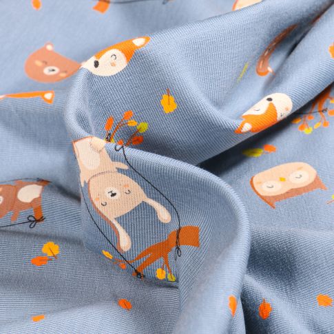 Tissu Jersey Coton Lapins balançoires sur fond Bleu lavande