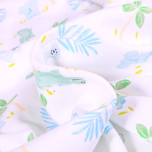 Tissu Jersey Coton Crocodile éléphant et palmier sur fond Blanc