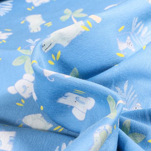 Tissu Jersey Coton Crocodile éléphant et palmier sur fond Bleu