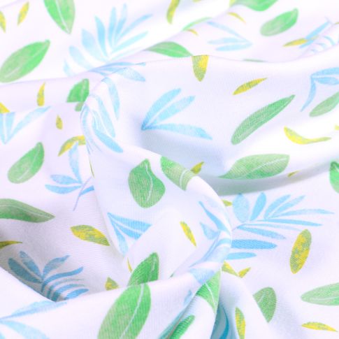 Tissu Jersey Coton Feuillages vert et bleu sur fond Blanc