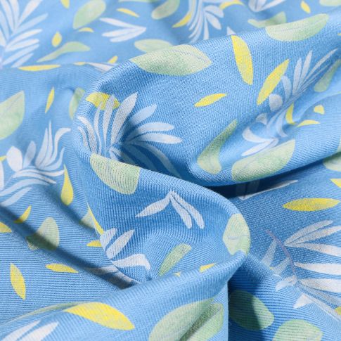 Tissu Jersey Coton Feuillages vert et bleu sur fond Bleu