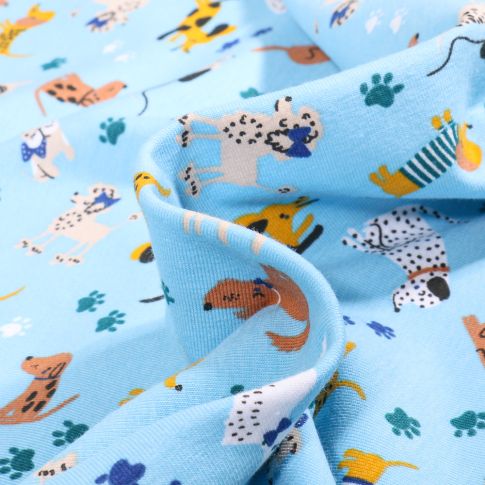 Tissu Jersey Coton Promenade chiens sur fond Bleu ciel