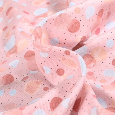 Tissu Jersey Coton Bulles et points rose sur fond Rose pâle
