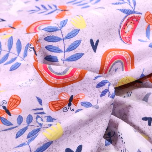 Tissu Jersey Coton Chat papillon et arc en ciel sur fond Mauve