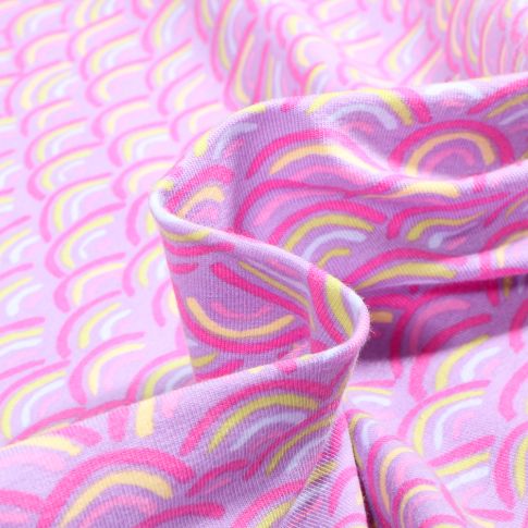 Tissu Jersey Coton Rainbow néon sur fond Lilas