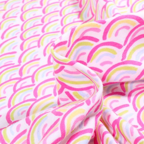 Tissu Jersey Coton Rainbow néon sur fond Blanc