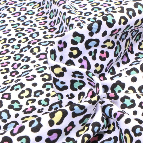 Tissu Jersey Coton Léo multicolores sur fond Blanc