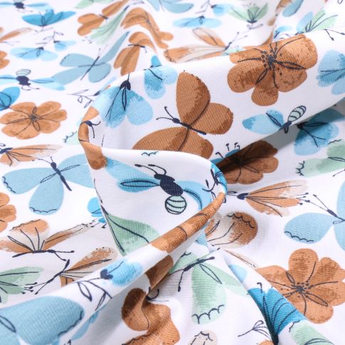 Tissu Jersey Coton Aqua papillons bleu sur fond Blanc