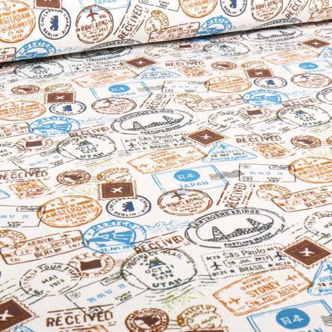 Tissu Jersey Coton Tampons Voyages bleu sur fond Ecru