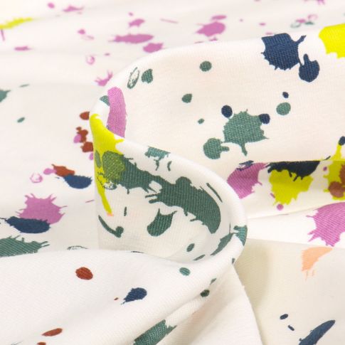 Tissu Jersey Coton Splash color jaune sur fond Blanc cassé