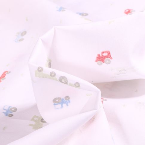 Tissu Coton imprimé Petits tracteurs sur fond Blanc