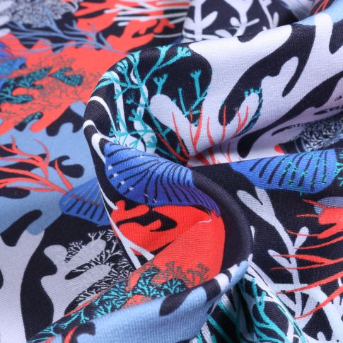 Tissu Sweat léger envers gratté Coraux et coquillages sur fond Bleu marine