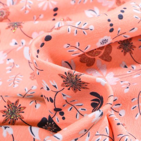 Tissu Jersey Coton Fleur Jeanne pailletée sur fond Corail