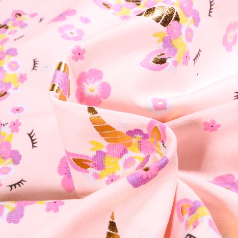 Tissu Jersey Coton Tête de licorne fleuris doré sur fond Rose