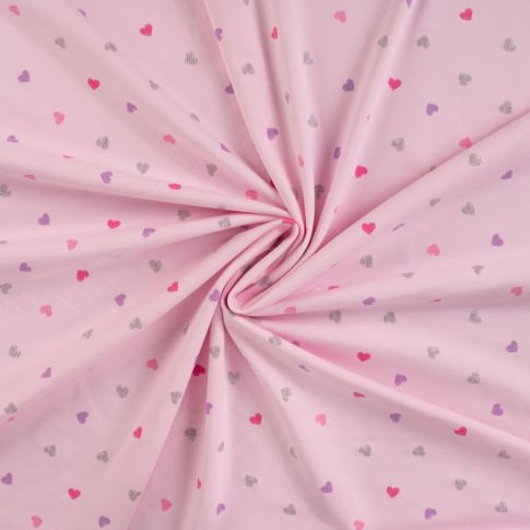 Tissu Jersey Coton Coeurs roses, lilas et argent pailleté sur fond Rose pâle