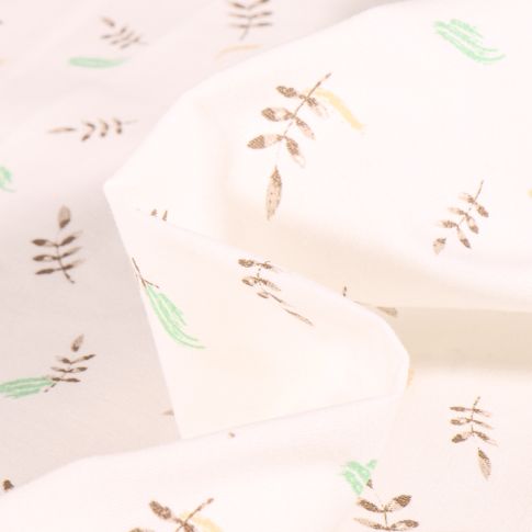 Tissu Coton imprimé Chally Feuilles au vent marron sur fond Ecru