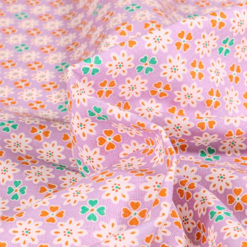 Tissu Coton imprimé Chally Trèfles et fleurs sur fond Parme