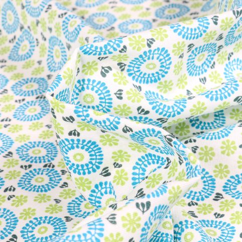 Tissu Coton imprimé Chally Cercles fleuris vert et bleu sur fond Blanc