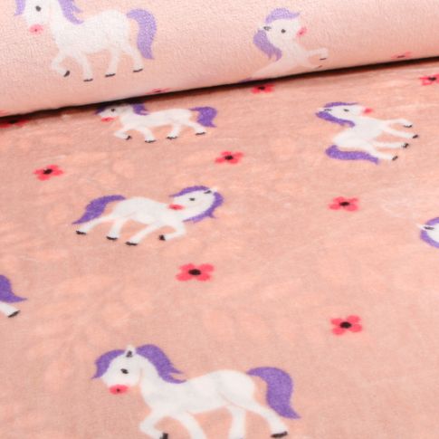 Tissu Doudou double face Pony sur fond Rose pâle