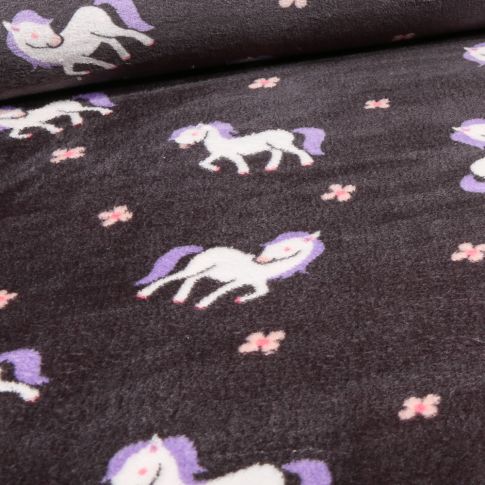 Tissu Doudou double face Pony sur fond Noir