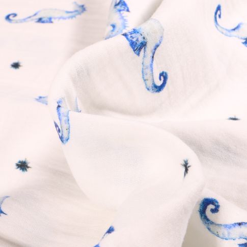 Tissu Double gaze Hippocampe bleu sur fond Blanc cassé