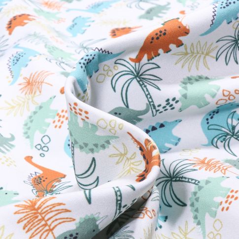 Tissu Softshell Dino jungle sur fond Blanc