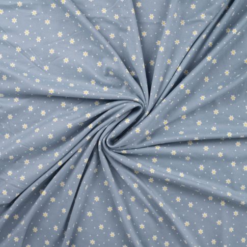 Tissu Jersey ultra doux Petites fleurs blanches sur fond Bleu